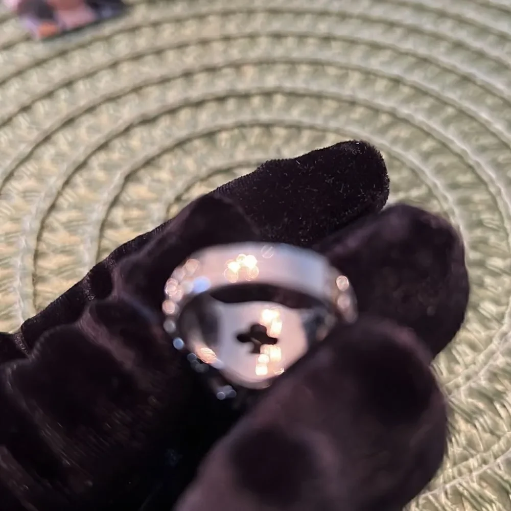 Miss Tina sz5.5 silver colored ring cutouts gold colored accent purple stone EUC